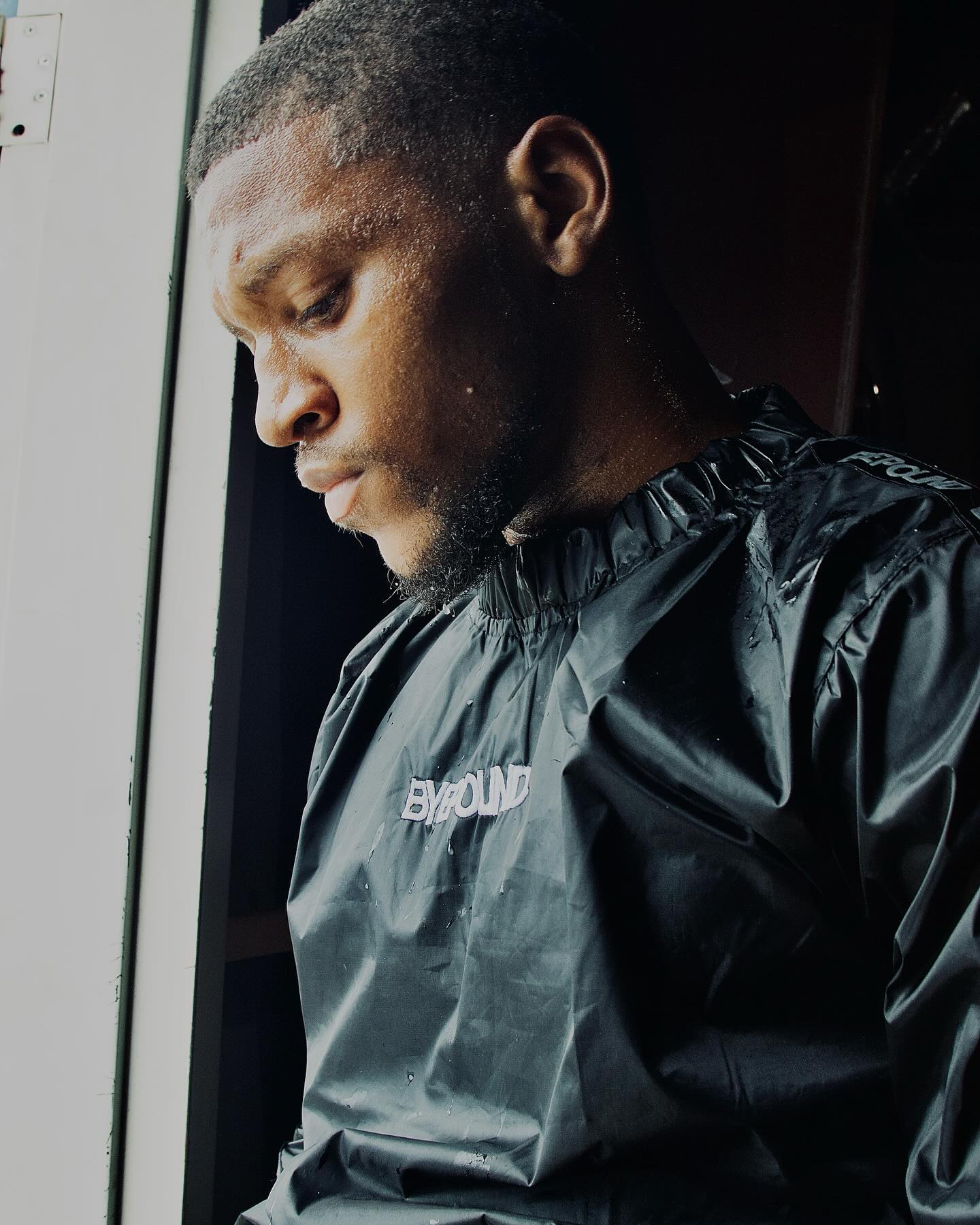 Athlete mid-cut in the Byepound sauna shell pullover
